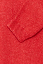 Load image into Gallery viewer, Close-up of a red sweater with a beveled cuff Detail