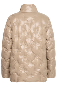 Beige quilted jacket on a white background