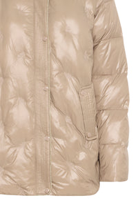 Beige puffer jacket on a white background