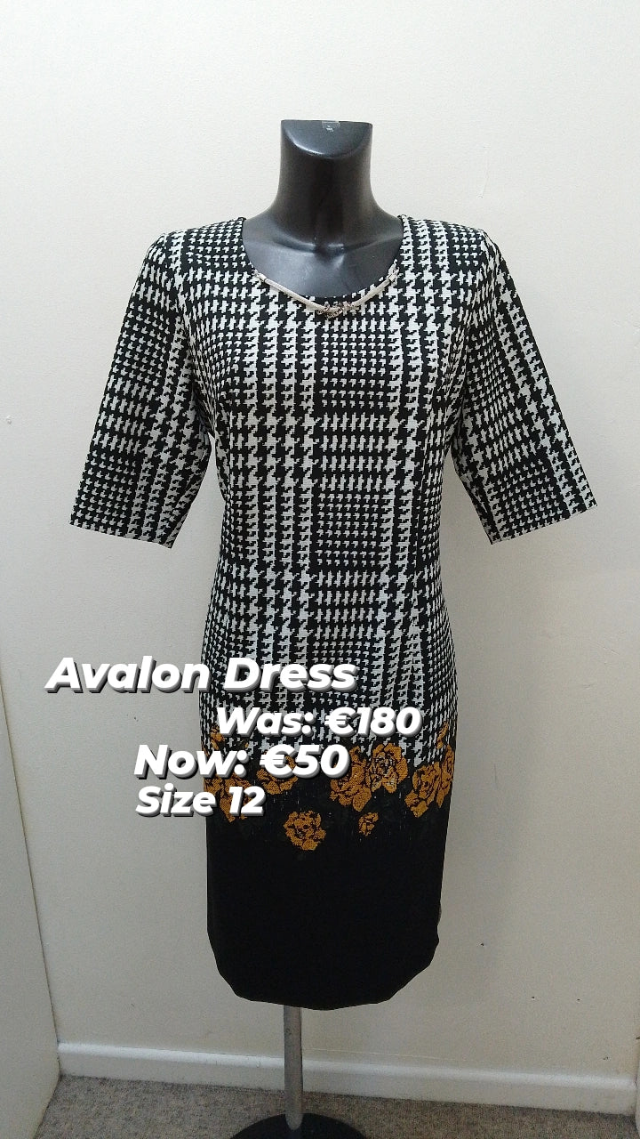 A7030- Black & White dress w/ mustard flower detail
